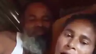An old man enjoys the boob sucking of a desi lady