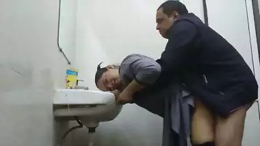 Wife in abroad fucked by office manager in washroom