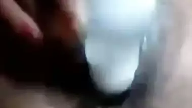 Desi nude girl fucks her pussy with a plastic bottle