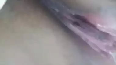 Risque Indian babe takes breasts and pussy out in a short porn video