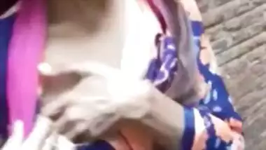 Adorable Desi cutie flashes curious friend her XXX tits in public