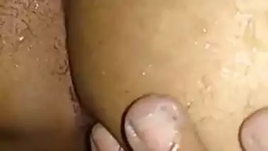 NRI porn of a big ass Indian slut fucking in the shower