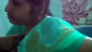 Horny Indian female un green helps man relax touching her XXX boobs